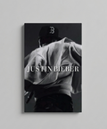 Justin Bieber velvet wall tapestry – dramatic back-turned concert shot in black and white with clean white name typography