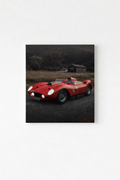 Vintage red Ferrari racing car parked in a moody rural landscape, printed on a velvet wall tapestry
